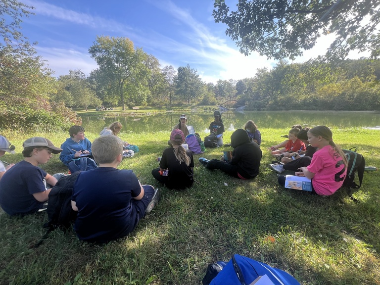 Students prepare to study wetland at Kent Park. 
