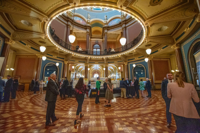 a wide shot showing the setup of the first flood rotunda during the Legislative Breakfast event at the Iowa State Capital