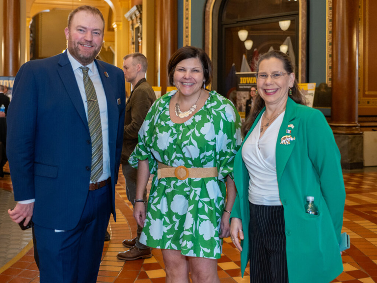 Legislators pose at the Legislative Breakfast event at the Iowa State Capital Rotunda
