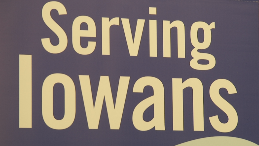A sign reading "Serving Iowans"