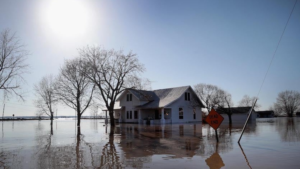 A home surrounded by floodwater